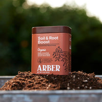 Organic plant food sold in an orange box from Arber.