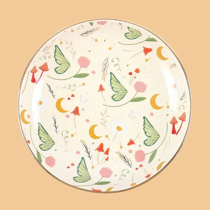 Decorative plate with butterfly and floral pattern on a white background