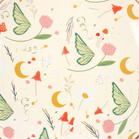 Pattern of green butterfly wings, pink flowers, and yellow crescent moons on a beige background. Ceramic plate print.